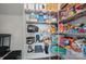 Organized pantry shelves filled with an assortment of food and small appliances at 637 Scotch Meadows Loop, Monroe, NC 28110