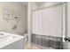 Bathroom featuring a single sink vanity and a bathtub with a shower curtain at 660 Daventry Ct # 35, Clover, SC 29710