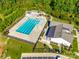 Aerial view of community pool with clubhouse and other amenities, surrounded by lush greenery at 660 Daventry Ct # 35, Clover, SC 29710