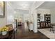 Elegant foyer with dark wood floors, offering a glimpse into the open-concept living spaces at 660 Daventry Ct # 35, Clover, SC 29710
