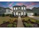 Charming two-story home with a landscaped front yard and inviting entrance in a Gathering-friendly neighborhood at 660 Daventry Ct # 35, Clover, SC 29710