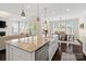 Bright, open kitchen with a large island, granite countertops, and seamless flow to the living and dining areas at 660 Daventry Ct # 35, Clover, SC 29710
