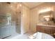 This bathroom has a glass shower, double vanity, and modern decor at 724 Ideal Way, Charlotte, NC 28203