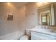 Bathroom featuring a tiled shower and tub combination, with a modern sink and vanity at 724 Ideal Way, Charlotte, NC 28203