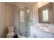 Bathroom featuring glass enclosed tiled shower and modern sink and vanity at 724 Ideal Way, Charlotte, NC 28203