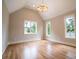 Bright bedroom with hardwood floors, large windows, and natural light at 724 Ideal Way, Charlotte, NC 28203