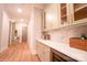 Hallway with cabinets and wine cooler at 724 Ideal Way, Charlotte, NC 28203