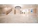 Large open living area with staircase and access to kitchen at 724 Ideal Way, Charlotte, NC 28203
