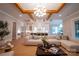 Spacious living room with beamed ceiling, modern furnishings, and open floor plan to the kitchen at 724 Ideal Way, Charlotte, NC 28203