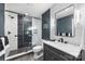 Stylish bathroom with a glass-enclosed shower, modern vanity, and elegant fixtures at 742 Lansdowne Rd, Charlotte, NC 28270