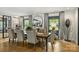 Bright dining room featuring large windows, modern decor, and elegant finishes at 742 Lansdowne Rd, Charlotte, NC 28270