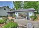 Charming guest house featuring large bi-fold doors, opening to a lovely stone garden at 742 Lansdowne Rd, Charlotte, NC 28270