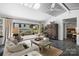 Bright living room with skylights, pool views, and stylish decor at 742 Lansdowne Rd, Charlotte, NC 28270