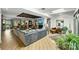 Large living room featuring wood floors, fireplace, and stylish furnishings at 742 Lansdowne Rd, Charlotte, NC 28270