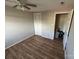 Simple bedroom with wood-look floors and closet at 7539 Holly Grove Ct, Charlotte, NC 28227