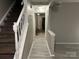 Hallway with stairs, leading to other rooms in the house at 7539 Holly Grove Ct, Charlotte, NC 28227