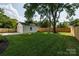Spacious backyard with a detached garage and a brand new privacy fence at 754 Wriston Pl, Charlotte, NC 28209