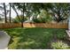 Expansive backyard featuring lush green grass and a privacy fence at 754 Wriston Pl, Charlotte, NC 28209