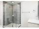 Bathroom featuring a glass enclosed shower, white countertops, and modern fixtures at 754 Wriston Pl, Charlotte, NC 28209