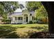 Charming renovated home with a manicured lawn and inviting front porch at 754 Wriston Pl, Charlotte, NC 28209