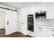 Modern kitchen features stainless steel appliances and updated fixtures at 754 Wriston Pl, Charlotte, NC 28209