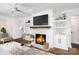Living room with fireplace and floating shelves at 754 Wriston Pl, Charlotte, NC 28209