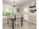 Cozy breakfast nook with a bay window and a view to the backyard at 8801 Chinaberry Ln, Concord, NC 28027