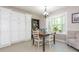 Cozy breakfast nook with a bay window and plenty of natural light at 8801 Chinaberry Ln, Concord, NC 28027