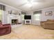 Inviting living room with fireplace, comfortable seating, and neutral decor at 8801 Chinaberry Ln, Concord, NC 28027