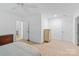 Large bedroom with multiple closets, carpet and a view of the hall bathroom at 9941 Heritage Oak Ln, Waxhaw, NC 28173