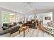 Inviting living area with hardwood floors, natural light, and an open layout at 9941 Heritage Oak Ln, Waxhaw, NC 28173