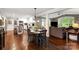 Open floor plan featuring eat-in kitchen and living room with hardwood floors and lots of natural light at 9941 Heritage Oak Ln, Waxhaw, NC 28173