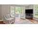 Bright living space leading to an outdoor deck, perfect for relaxing and entertaining at 9941 Heritage Oak Ln, Waxhaw, NC 28173