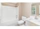 Standard white bathroom features a shower-tub combination, toilet, and sink at 1000 Rudd Rd, Gastonia, NC 28054