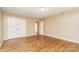 Bedroom featuring hardwood floors and closet, complemented by interior views at 1000 Rudd Rd, Gastonia, NC 28054