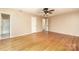 Bedroom features hardwood floors, neutral paint, and a closet, offering ample storage space at 1000 Rudd Rd, Gastonia, NC 28054