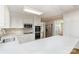 Modern kitchen featuring white cabinets, stainless steel appliances, and quartz countertops at 1000 Rudd Rd, Gastonia, NC 28054