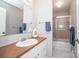 Bathroom featuring a single sink vanity, a walk-in shower and neutral walls at 114 Walnut Creek Rd # 24, Belmont, NC 28012