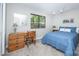 Bedroom with desk and chair, natural light, and a view of the wooded backyard at 114 Walnut Creek Rd # 24, Belmont, NC 28012