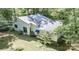 Exterior shot showcasing the home's architecture, landscaped yard, and natural surroundings at 114 Walnut Creek Rd # 24, Belmont, NC 28012