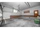 View of garage featuring ample space, red brick trim, and neutral walls at 114 Walnut Creek Rd # 24, Belmont, NC 28012