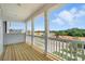 Outdoor porch boasting a wooden deck, white rails and supports, with picturesque views of nature at 119 Longwood Rd # 62, Mooresville, NC 28115