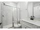 Modern bathroom featuring a glass-enclosed shower with subway tile and a stylish vanity at 119 Longwood Rd # 62, Mooresville, NC 28115