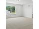 Spacious bedroom featuring a large window with natural light at 119 Longwood Rd # 62, Mooresville, NC 28115