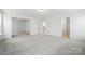 Large bonus room with access to a bedroom and hallway at 119 Longwood Rd # 62, Mooresville, NC 28115