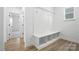Mudroom area with built-in bench, coat hooks, and convenient storage solutions at 119 Longwood Rd # 62, Mooresville, NC 28115