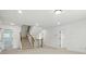 Bright staircase features carpeted treads and white risers at 119 Longwood Rd # 62, Mooresville, NC 28115