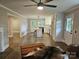 Open-concept living room features a kitchen island, modern finishes, and natural light at 13131 601 S Hwy, Midland, NC 28107