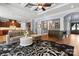Open-concept living room flows into the kitchen with a bar area, perfect for entertaining and everyday living at 15909 Heath Aster Way, Davidson, NC 28036