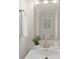 Bathroom with modern sink, large mirror and brushed metal hardware at 1841 Bear St, Charlotte, NC 28213